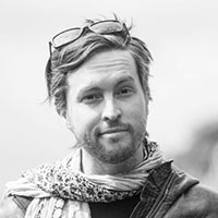 Black and white headshot of Will Dayble